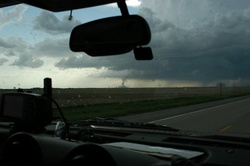 DSC_3315a (Judd Spittler photo)We jumped back in the car and sped toward the tornado, hoping to get more shots.  As it turns out, the tornado quickly disappeared.We continued our drive, looking for more tornados, and trying to see if we could locate signs of the tornado's path.  We didn't see any more tornados, or locate any signs of the "our" tornado's path.The tornado had probably been eight miles or so away when we took our first pictures.  We were probably five miles or less away when we took our closest photosWe returned "home", fired up the barbeque and had supper.  It was a beautiful evening to be outside.