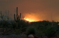 This is a composite of two photos taken at 12:20am and 5:45am July 6. 